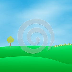 Green landscape with blue sky