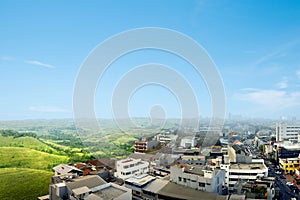 Green landscapes and city with a blue sky background