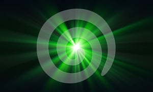 Green laser beam on a dark background