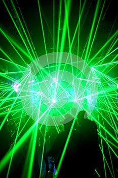 Green laser show rays stream