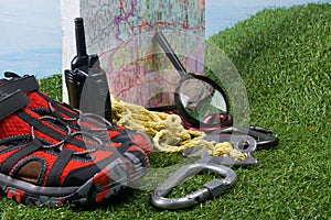 on a green lawn background, a set of items to search for, tourists, difficult situations, map, walkie-talkie and prepared