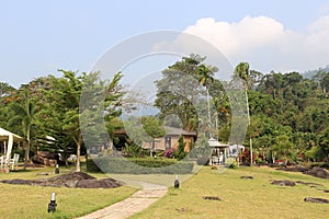 Green lawn of garden resort and have good weather.