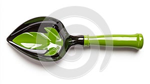 Green leaf-shaped shovel isolated on white background photo