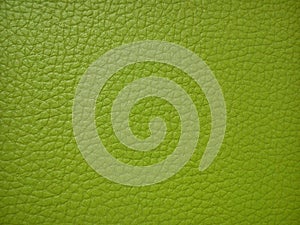 Green leather for sofa or chair. Close-up