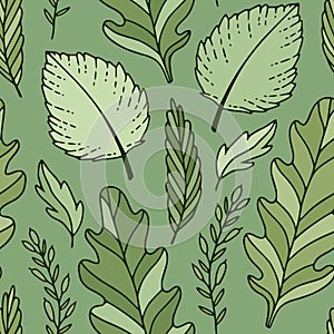 Green leaves background. Pattern of bright greeny leaves. Fabric design. Textile and wallpaper seamless pattern photo