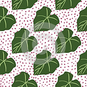 Green leaves seamless pattern on dots background. Foliage wallpaper in flat style
