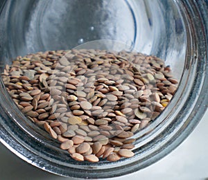 Green lentils in a crystal jar