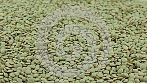 Green lentils in the foreground, Flat lay composition. Organic grains