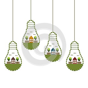 Green Light Bulbs With Wooden Eco Houses And Trees, Think Green Concept