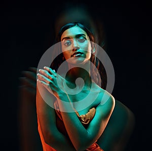 Green light, fashion and Indian woman with beauty, glowing skin and luxury brand aesthetic. Creative lighting, young