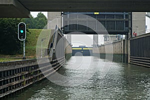 Green light marks entrance to nautical lock