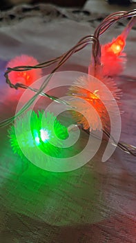 green light red color, light bulbs garlands, holiday objects