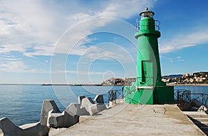 A green lighthouse