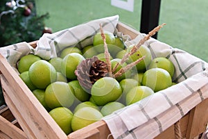 The green lime in the wood box.