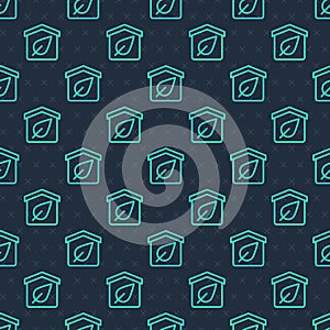 Green line Eco friendly house icon isolated seamless pattern on blue background. Eco house with leaf. Vector