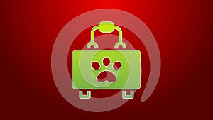 Green line Pet first aid kit icon isolated on red background. Dog or cat paw print. Clinic box. 4K Video motion graphic