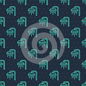 Green line Shower head with water drops flowing icon isolated seamless pattern on blue background. Vector