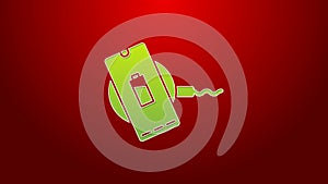 Green line Smartphone charging on wireless charger icon isolated on red background. Charging battery on charging pad. 4K