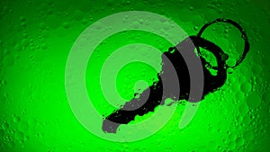 Green liquid background with key