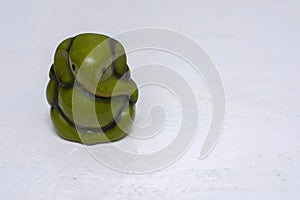 A green lord Ganesha statue on a white background