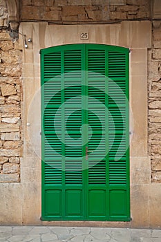 Green Louvered Door