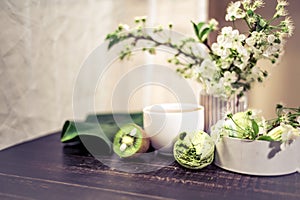 Green macarons on a wood table for coffee or a tea