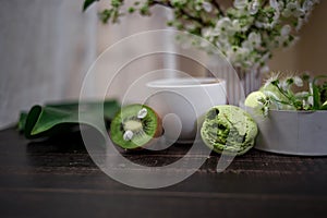 Green macarons on a wood table for coffee or a tea