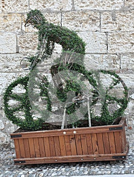 Green man on a bicycle