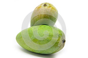 Green mangoes isolated on white background