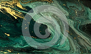 Green marble abstract acrylic background. Marbling artwork texture. Agate ripple pattern. Gold powder.