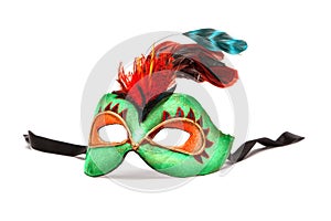 Green Mardi Gras Mask with feathers on white background with black ribbon