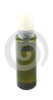 Green massage oil bottle isolated