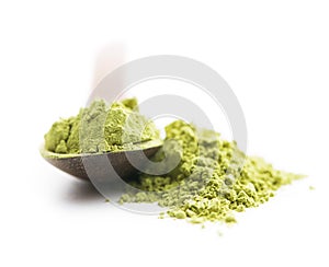 Green matcha tea powder.