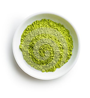 Green matcha tea powder.