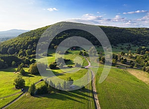 Green meadow with forest from drone with nice hill, Slovakia - Pohronsky Inovec