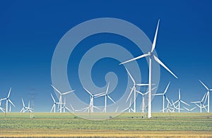 Green meadow with Wind turbines