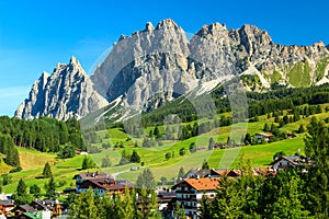 Green meadows and high mountains above Cortina D ampezzo,Italy photo