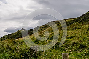 Green meadows in northern ireland along the coast of antrim