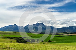 Green meadows under High Tatras mountains, Slovakia