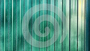 Green Metal fence with vertical picket fence and lines. Abstract background, frame, texture with place for text and copy