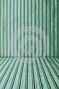 Green metal sheet background.