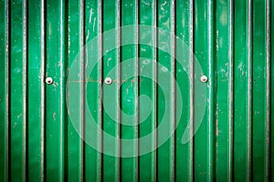 Green metal sheet with bolt