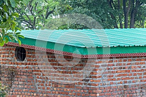 Green Metal Sheet Roofing of recently constructed building