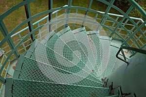 Green metal spiral stairs