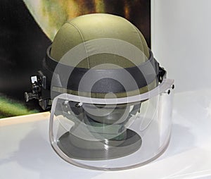 Green military anti mine helmet with visor