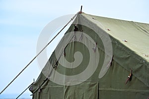Green military tent detail shot