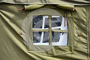 Green military tent detail shot