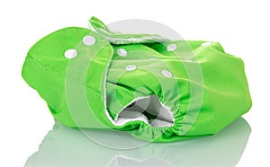 Green modern eco-friendly diaper is on white.