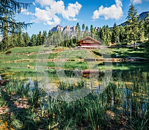 Green morning view of small mountain lake - Scin. Bright summer scene of Dolomiti Alps, Cortina d`Ampezzo, Province of Belluno, I