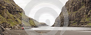 Green mountain hill landscape at the black beach near saksun village on the Faroe Islands, Denmark.